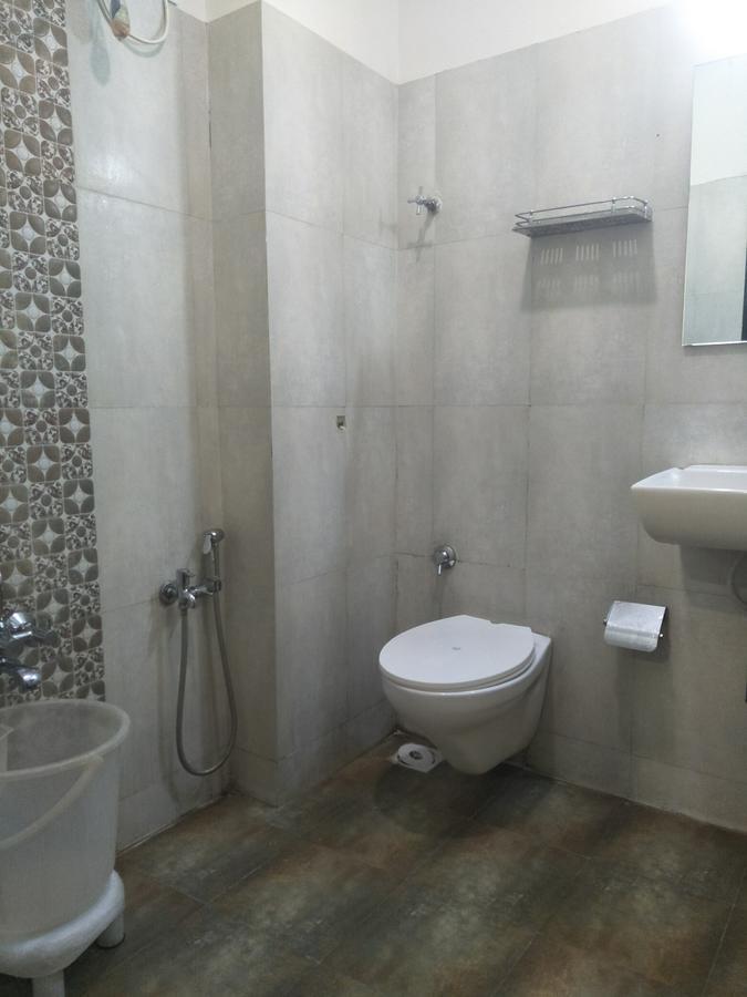 Hotel Ambience Sarkhej Bagian luar foto